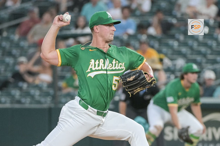 Jul 11, 2025; West Sacramento, California, USA; Athletics pitcher Jack Perkins (50) throws a pitch against the Toronto Blue Jays during the fifth inning at Sutter Health Park. Credit: Ed Szczepanski-Imagn Images