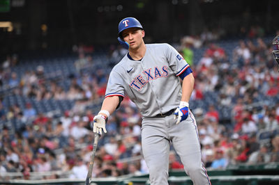 Jun 6, 2025; Washington, District of Columbia, USA; Texas Rangers shortstop Corey Seager (5) tosses his bat after drawing a walk during the fifth inning against the Washington Nationals at Nationals Park. Mandatory Credit: Rafael Suanes-Imagn Images