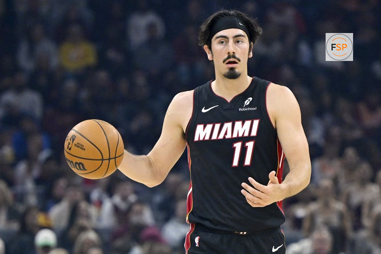 Mar 25, 2026; Cleveland, Ohio, USA; Miami Heat forward Jaime Jaquez Jr. (11) brings the ball up court in the first quarter against the Cleveland Cavaliers at Rocket Arena. Credit: David Richard-Imagn Images