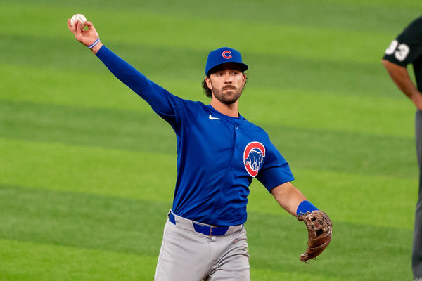 ARLINGTON, TX - MARCH 28: Chicago Cubs shortstop Dansby Swanson (7) throws during opening day of the 2024 season between the Chicago Cubs and the Texas Rangers on March 28, 2024 at Globe Life Field in Arlington, TX. (Photo by Chris Leduc/Icon Sportswire)