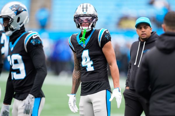 Nov 30, 2025; Charlotte, North Carolina, USA; Carolina Panthers wide receiver Tetairoa McMillan (4) looks on before the game against the Los Angeles Rams at Bank of America Stadium. Mandatory Credit: Jim Dedmon-Imagn Images