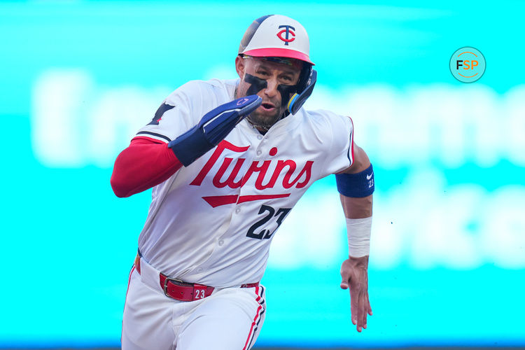 Aug 13, 2024; Minneapolis, Minnesota, USA; Minnesota Twins designated hitter Royce Lewis (23) runs to third against the Kansas City Royals in the first inning at Target Field. Credit: Brad Rempel-USA TODAY Sports