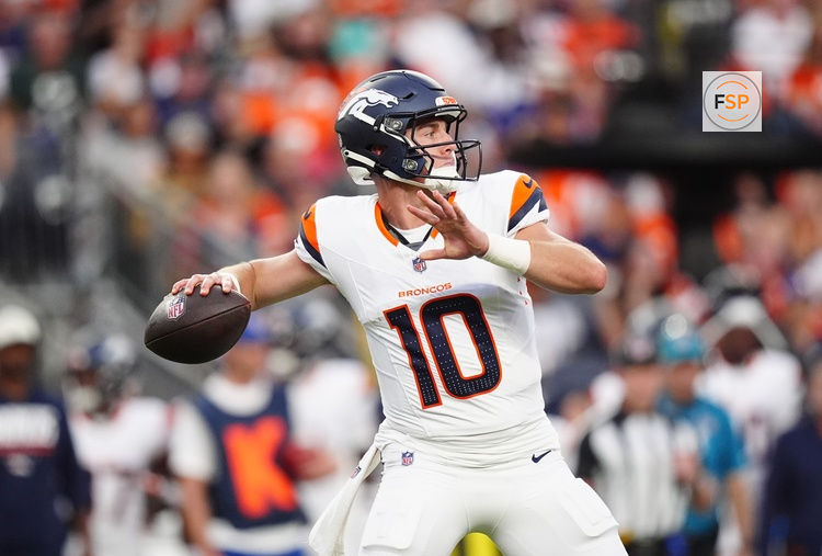 Aug 21, 2026; Denver, Colorado, USA;  Denver Broncos quarterback Bo Nix (10) during the first quarter of a preseason game against the Green Bay Packers at Empower Field at Mile High.  Credit: Ron Chenoy-Imagn Images