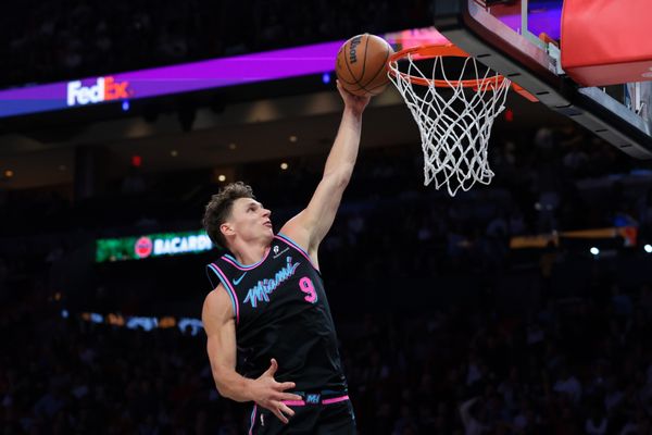 Dec 27, 2025; Miami, Florida, USA; Miami Heat guard Pelle Larsson (9) dunks against the Indiana Pacers during the second half at Kaseya Center. Mandatory Credit: Sam Navarro-Imagn Images