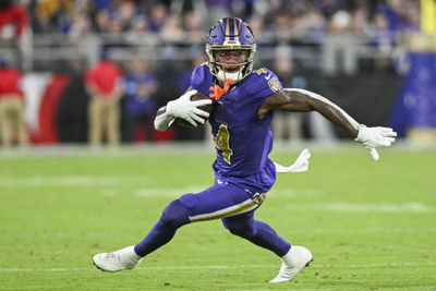 Nov 7, 2024; Baltimore, Maryland, USA; Baltimore Ravens wide receiver Zay Flowers (4) runs after a second quarter catch against the Cincinnati Bengals at M&T Bank Stadium. Mandatory Credit: Tommy Gilligan-Imagn Images