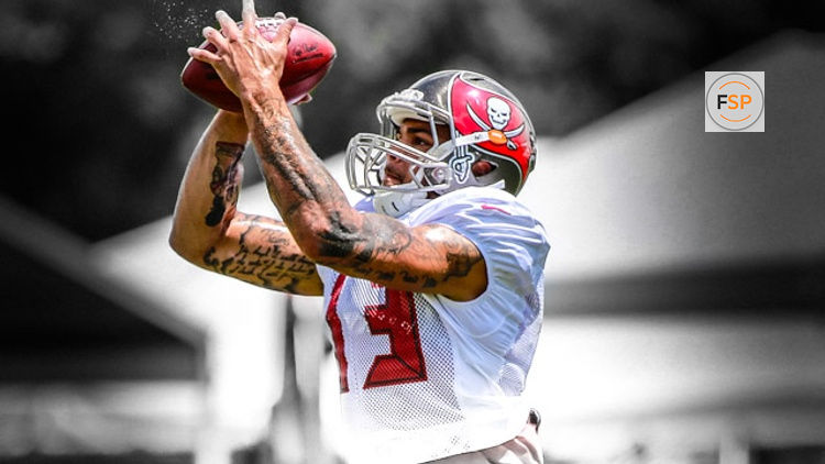 Aug 6, 2015; Tampa Bay, FL, USA; Tampa Bay Buccaneers wide receiver Mike Evans (13) catches the ball as he works out during training camp at One Buc Place. Mandatory Credit: Kim Klement-USA TODAY Sports