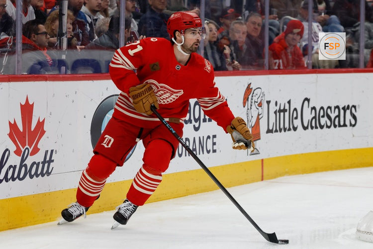 Jan 31, 2026; Detroit, Michigan, USA;  Detroit Red Wings center Dylan Larkin (71) skates with the puck in the first period against the Colorado Avalanche at Little Caesars Arena. Credit: Rick Osentoski-Imagn Images