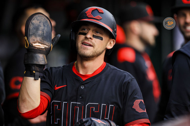 May 23, 2025; Cincinnati, Ohio, USA; Cincinnati Reds outfielder TJ Friedl (29) high fives teammates after scoring on a double hit by third baseman Santiago Espinal (not pictured) in the first inning against the Chicago Cubs at Great American Ball Park. Credit: Katie Stratman-Imagn Images