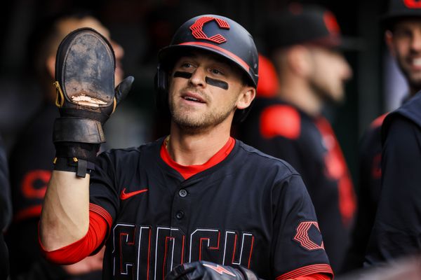 May 23, 2025; Cincinnati, Ohio, USA; Cincinnati Reds outfielder TJ Friedl (29) high fives teammates after scoring on a double hit by third baseman Santiago Espinal (not pictured) in the first inning against the Chicago Cubs at Great American Ball Park. Mandatory Credit: Katie Stratman-Imagn Images