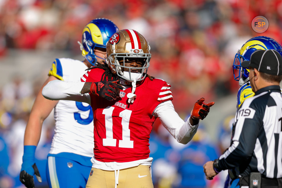 Jan 7, 2024; Santa Clara, California, USA; San Francisco 49ers wide receiver Brandon Aiyuk (11) celebrates after a play against the Los Angeles Rams during the first quarter at Levi's Stadium. Credit: Sergio Estrada-USA TODAY Sports