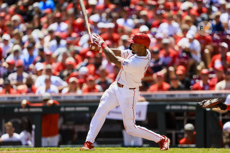 May 18, 2025; Cincinnati, Ohio, USA; Cincinnati Reds outfielder Will Benson (30) hits a two-run home run in the fourth inning against the Cleveland Guardians at Great American Ball Park. Credit: Katie Stratman-Imagn Images