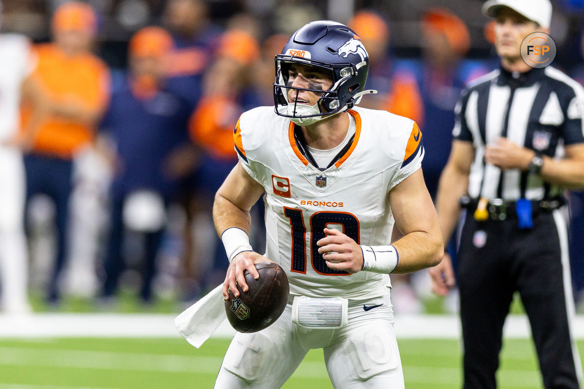 Oct 17, 2024; New Orleans, Louisiana, USA;  Denver Broncos quarterback Bo Nix (10) looks to pas downfield against the New Orleans Saints during the first half at Caesars Superdome. Credit: Stephen Lew-Imagn Images