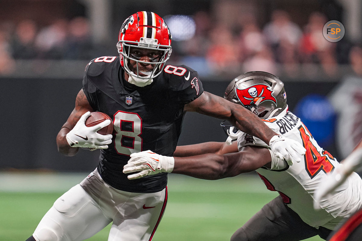 Oct 3, 2024; Atlanta, Georgia, USA; Atlanta Falcons tight end Kyle Pitts (8) runs against Tampa Bay Buccaneers linebacker Chris Braswell (43) after a catch at Mercedes-Benz Stadium. Credit: Dale Zanine-Imagn Images