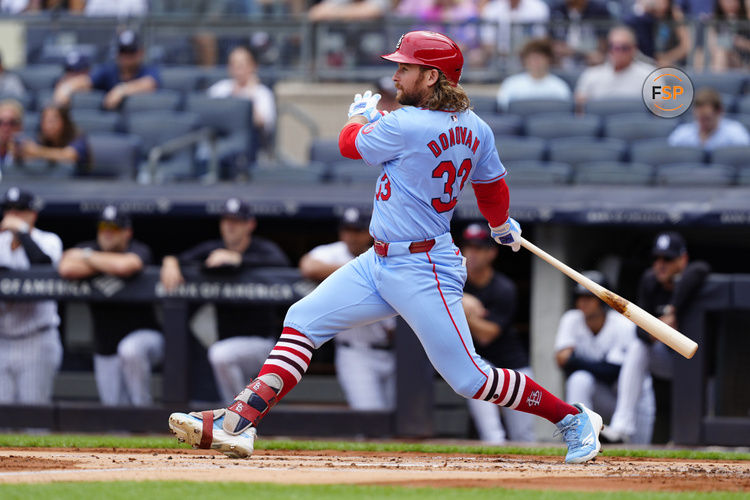 Aug 31, 2024; Bronx, New York, USA; St. Louis Cardinals second baseman Brendan Donovan (33) hits a ground ball against the New York Yankees during the first inning at Yankee Stadium. Credit: Gregory Fisher-USA TODAY Sports