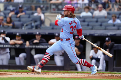 Aug 31, 2024; Bronx, New York, USA; St. Louis Cardinals second baseman Brendan Donovan (33) hits a ground ball against the New York Yankees during the first inning at Yankee Stadium. Mandatory Credit: Gregory Fisher-USA TODAY Sports