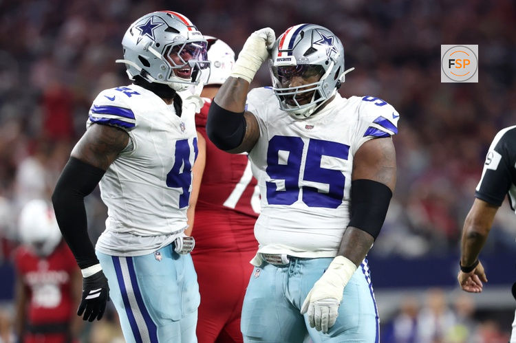 Nov 3, 2025; Arlington, Texas, USA; Dallas Cowboys defensive tackle Kenny Clark (95) and defensive end Donovan Ezeiruaku (41) celebrate after a sack Arizona Cardinals quarterback Jacoby Brissett (7) in the second half at AT&T Stadium. Credit: Kevin Jairaj-Imagn Images