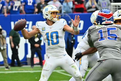Sep 27, 2026; Orchard Park, New York, USA;  Los Angeles Chargers quarterback Justin Herbert (10) throws in the second half against the Buffalo Bills at New Highmark Stadium.  Mandatory Credit: Mark Konezny-Imagn Images