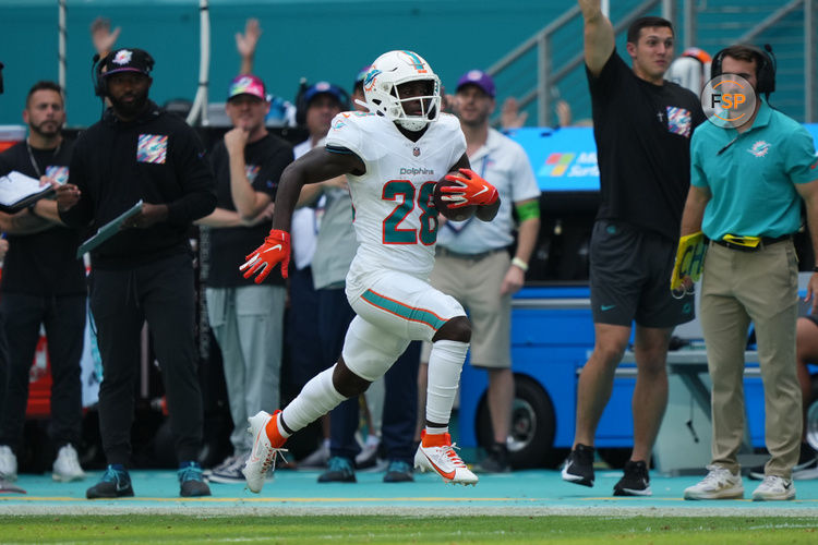 Oct 8, 2023; Miami Gardens, Florida, USA; Miami Dolphins running back De'Von Achane (28) runs with the ball against the New York Giants during the first half at Hard Rock Stadium. Credit: Jasen Vinlove-USA TODAY Sports