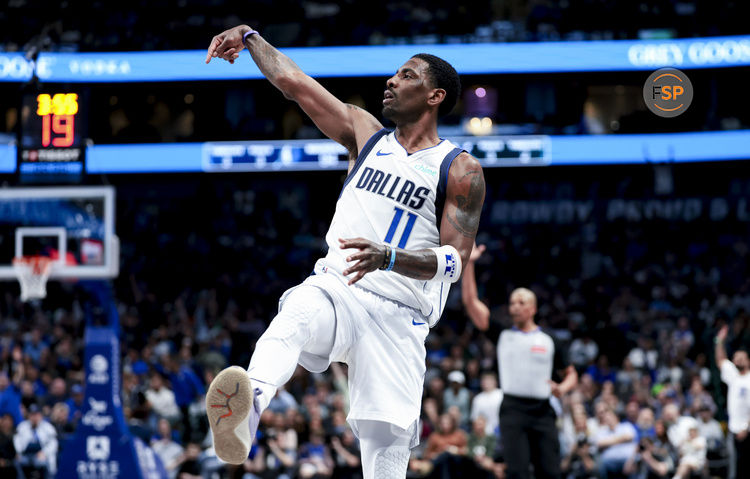 Feb 27, 2025; Dallas, Texas, USA;  Dallas Mavericks guard Kyrie Irving (11) reacts after shooting against the Charlotte Hornets during the second half at American Airlines Center. Credit: Kevin Jairaj-Imagn Images