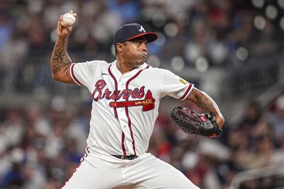 May 13, 2026; Cumberland, Georgia, USA; Atlanta Braves pitcher Raisel Iglesias (26) pitches against the Chicago Cubs during the ninth inning at Truist Park. Mandatory Credit: Dale Zanine-Imagn Images