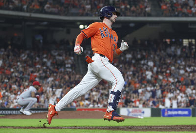 Sep 20, 2024; Houston, Texas, USA; Los Angeles Angels relief pitcher Roansy Contreras (57) reacts and Houston Astros right fielder Kyle Tucker (30) rounds the bases after hitting a home run during the sixth inning at Minute Maid Park. Mandatory Credit: Troy Taormina-Imagn Images