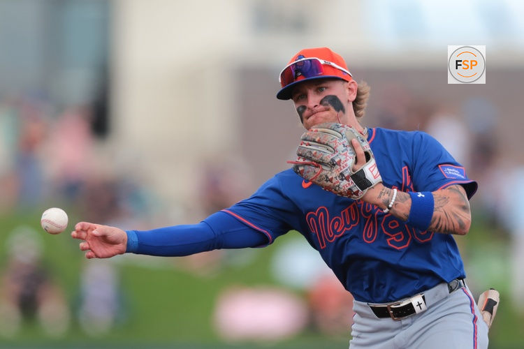 Feb 23, 2025; West Palm Beach, Florida, USA; New York Mets second baseman Jett Williams (90) throws to first base and retires Washington Nationals second baseman Luis Garcia Jr. (not pictured) during the third inning at CACTI Park of the Palm Beaches. Credit: Sam Navarro-Imagn Images