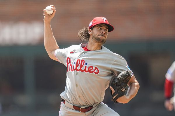 Apr 26, 2026; Cumberland, Georgia, USA; Philadelphia Phillies pitcher Aaron Nola (27) pitches against the Atlanta Braves during the first inning at Truist Park. Mandatory Credit: Dale Zanine-Imagn Images