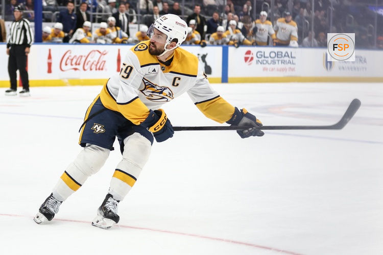 Jan 31, 2026; Elmont, New York, USA;  Nashville Predators defenseman Roman Josi (59) watches after scoring the go ahead goal in the third period against the New York Islanders at UBS Arena. Credit: Wendell Cruz-Imagn Images