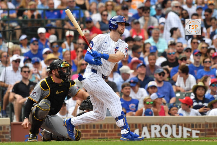 Aug 16, 2025; Chicago, Illinois, USA; Chicago Cubs right fielder Kyle Tucker (30) hits a single during the eighth inning against the Pittsburgh Pirates at Wrigley Field. Credit: Patrick Gorski-Imagn Images