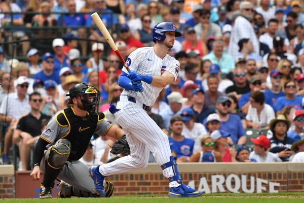 Aug 16, 2025; Chicago, Illinois, USA; Chicago Cubs right fielder Kyle Tucker (30) hits a single during the eighth inning against the Pittsburgh Pirates at Wrigley Field. Mandatory Credit: Patrick Gorski-Imagn Images