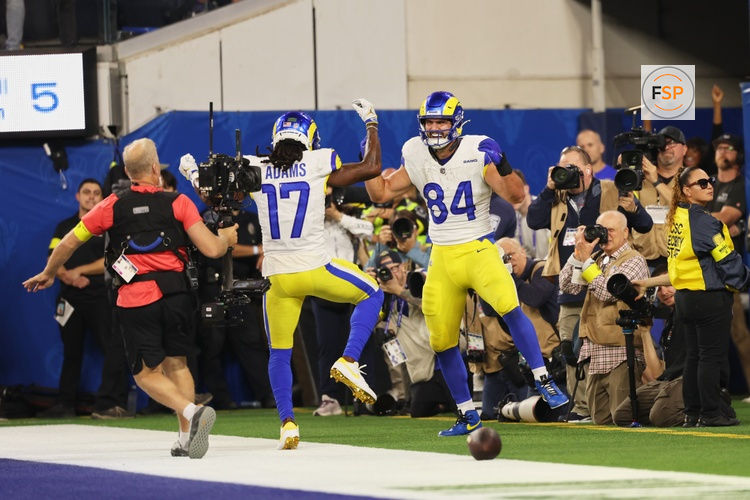 Nov 23, 2025; Inglewood, California, USA; Los Angeles Rams tight end Colby Parkinson (84) celebrates with wide receiver Davante Adams (17) after catching a touchdown pass against the Tampa Bay Buccaneers during the second quarter at SoFi Stadium. Credit: Kiyoshi Mio-Imagn Images