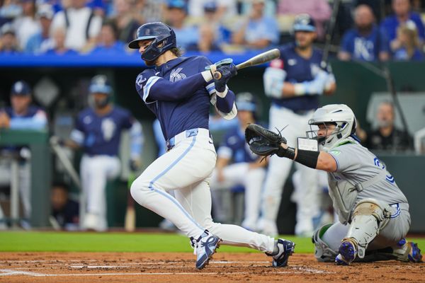 Sep 19, 2025; Kansas City, Missouri, USA; Kansas City Royals shortstop Bobby Witt Jr. (7) hits a single during the first inning against the Toronto Blue Jays at Kauffman Stadium. Mandatory Credit: Jay Biggerstaff-Imagn Images