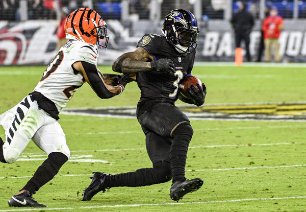 BALTIMORE, MD - NOVEMBER 16:  Baltimore Ravens wide receiver Odell Beckham Jr. (3) makes a reception against Cincinnati Bengals cornerback DJ Turner II (20) during the Cincinnati Bengals game versus the Baltimore Ravens on November 16, 2023 at M&T Bank Stadium in Baltimore, MD.  (Photo by Mark Goldman/Icon Sportswire)