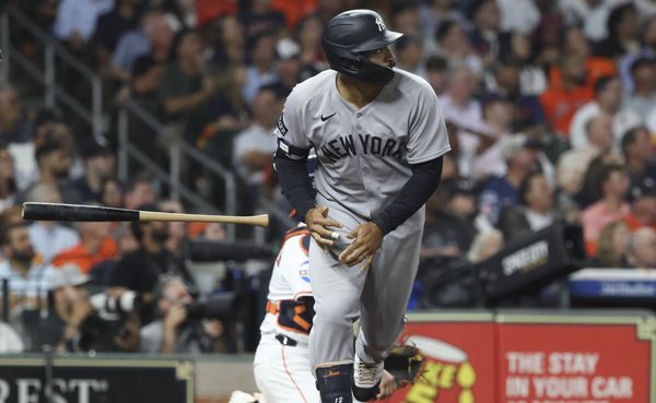 Sep 2, 2025; Houston, Texas, USA; New York Yankees center fielder Trent Grisham (12) hits a grand slam during the fifth inning against the Houston Astros at Daikin Park. Mandatory Credit: Troy Taormina-Imagn Images