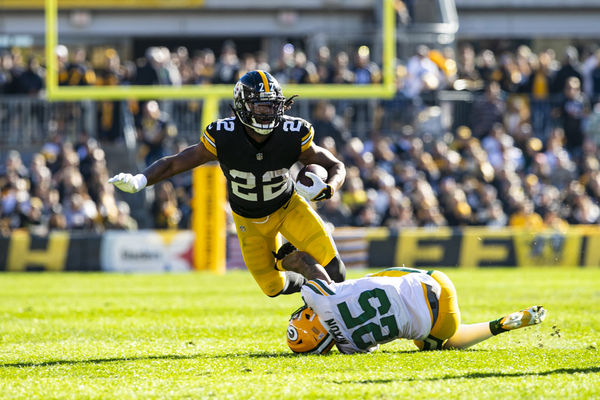 PITTSBURGH, PA - NOVEMBER 12: Pittsburgh Steelers running back Najee Harris (22) is tackled by Green Bay Packers cornerback Keisean Nixon (25) during the regular season NFL football game between the Green Bay Packers and Pittsburgh Steelers on November 12, 2023 at Acrisure Stadium in Pittsburgh, PA. (Photo by Mark Alberti/Icon Sportswire)