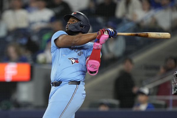 May 29, 2025; Toronto, Ontario, CAN; Toronto Blue Jays first baseman Vladimir Guerrero (27) hits a two run home run against the Athletics during the second inning at Rogers Centre. Mandatory Credit: John E. Sokolowski-Imagn Images