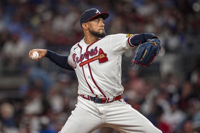 May 13, 2026; Cumberland, Georgia, USA; Atlanta Braves pitcher Robert Suarez (75) pitches against the Chicago Cubs during the eighth inning at Truist Park. Mandatory Credit: Dale Zanine-Imagn Images