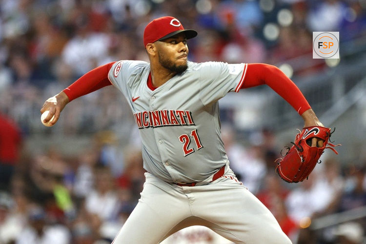 ATLANTA, GA - JULY 22: Cincinnati Reds starting pitcher Hunter Greene #21 delivers a pitch during the MLB game between the Cincinnati Reds and the Atlanta Braves on July 22, 2024 at TRUIST Park in Atlanta, GA. (Photo by Jeff Robinson/Icon Sportswire)