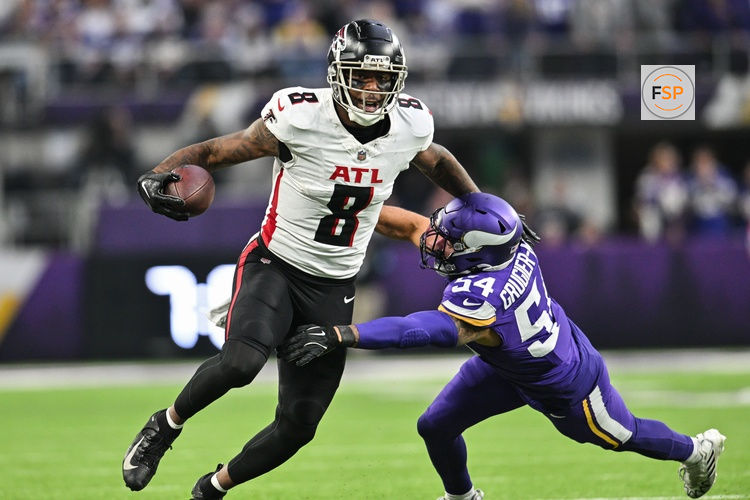 Dec 8, 2024; Minneapolis, Minnesota, USA; Atlanta Falcons tight end Kyle Pitts (8) gets yards after the catch as Minnesota Vikings linebacker Kamu Grugier-Hill (54) attempts to make the tackle during the fourth quarter at U.S. Bank Stadium. Credit: Jeffrey Becker-Imagn Images