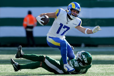 Dec 22, 2024; East Rutherford, New Jersey, USA; New York Jets safety Chuck Clark (36) tackles Los Angeles Rams wide receiver Puka Nacua (17) during the first quarter at MetLife Stadium. Mandatory Credit: Brad Penner-Imagn Images