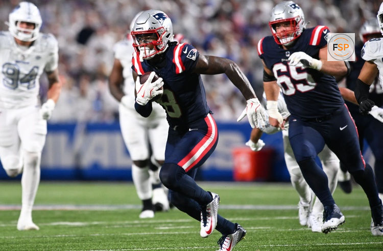Oct 5, 2025; Orchard Park, New York, USA; New England Patriots wide receiver Stefon Diggs (8) makes a catch against the Buffalo Bills during the second half at Highmark Stadium. Credit: Mark Konezny-Imagn Images