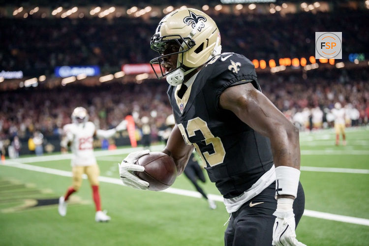 Sep 14, 2025; New Orleans, Louisiana, USA;  New Orleans Saints tight end Juwan Johnson (83) celebrates after he caught a touchdown against the San Francisco 49ers during the second quarter at Caesars Superdome. Credit: Matthew Hinton-Imagn Images