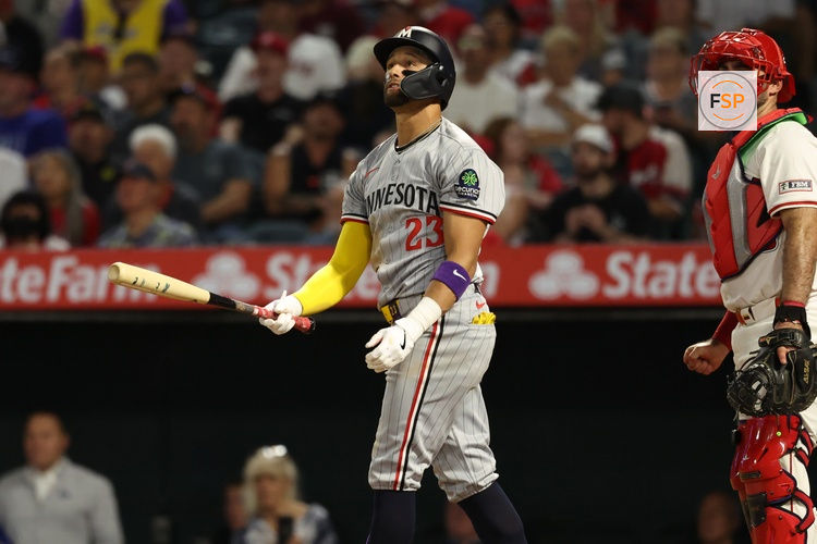 Sep 8, 2025; Anaheim, California, USA;  Minnesota Twins third baseman Royce Lewis (23) hits a two-run home run during the fifth inning against the Los Angeles Angels at Angel Stadium. Credit: Kiyoshi Mio-Imagn Images