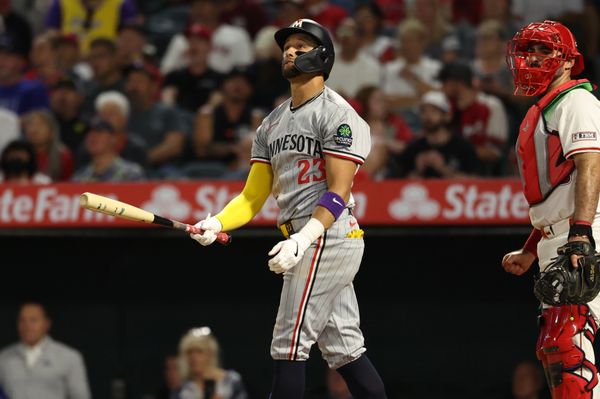 Sep 8, 2025; Anaheim, California, USA;  Minnesota Twins third baseman Royce Lewis (23) hits a two-run home run during the fifth inning against the Los Angeles Angels at Angel Stadium. Mandatory Credit: Kiyoshi Mio-Imagn Images