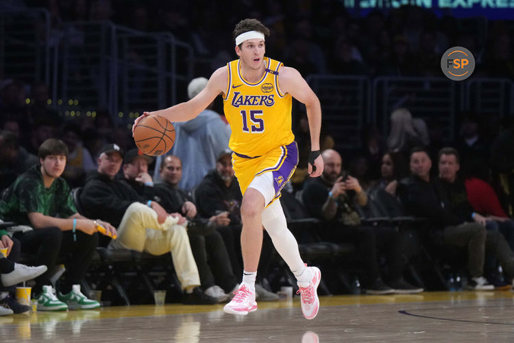 Jan 23, 2025; Los Angeles, California, USA; Los Angeles Lakers guard Austin Reaves (15) dribbles the ball against the Boston Celtics at the Crypto.com Arena. Credit: Kirby Lee-Imagn Images