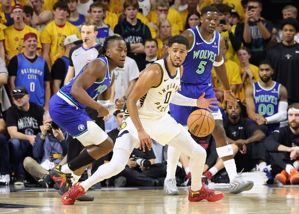 Oct 7, 2026; Ames, Iowa, USA;  Indiana Pacers guard Tyrese Haliburton (0) is defended by Minnesota Timberwolves forward Jonathan Kuminga (24) at James H. Hilton Coliseum.  Mandatory Credit: Reese Strickland-Imagn Images