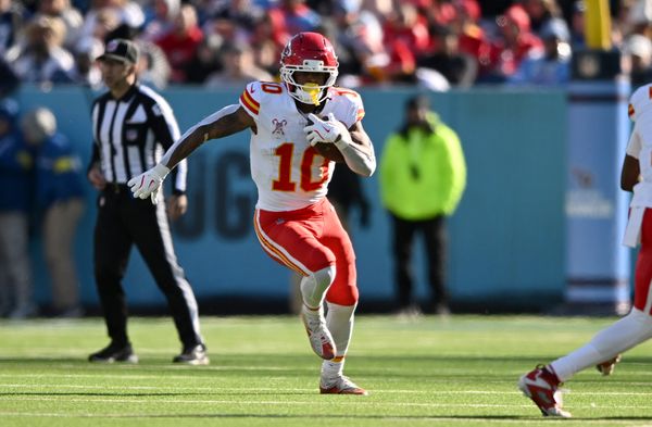 Dec 21, 2025; Nashville, Tennessee, USA; Kansas City Chiefs running back Isiah Pacheco (10) runs during the first half against the Tennessee Titans at Nissan Stadium. Mandatory Credit: Steve Roberts-Imagn Images