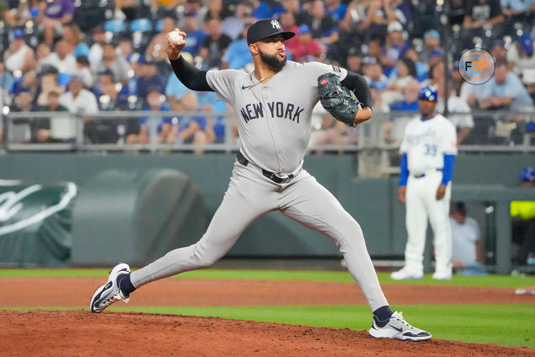 Jun 12, 2025; Kansas City, Missouri, USA; New York Yankees relief pitcher Devin Williams (38) delivers a pitch against the Kansas City Royals in the ninth inning at Kauffman Stadium. Credit: Denny Medley-Imagn Images
