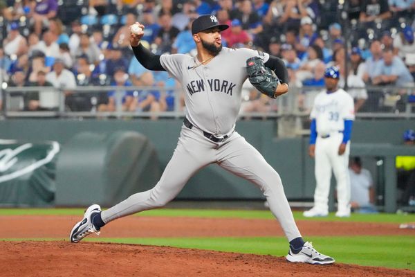 Jun 12, 2025; Kansas City, Missouri, USA; New York Yankees relief pitcher Devin Williams (38) delivers a pitch against the Kansas City Royals in the ninth inning at Kauffman Stadium. Mandatory Credit: Denny Medley-Imagn Images