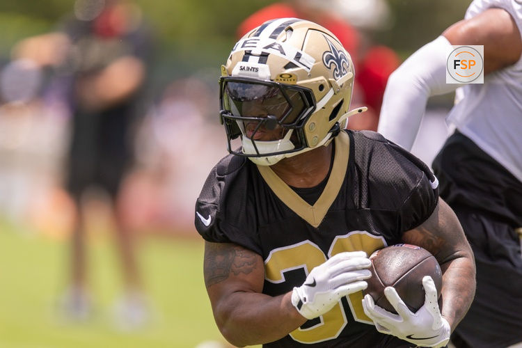 Jun 10, 2025; New Orleans, LA, USA;  New Orleans Saints running back Devin Neal (30) on running back drills during minicamp at Ochsner Sports Performance Center. Credit: Stephen Lew-Imagn Images